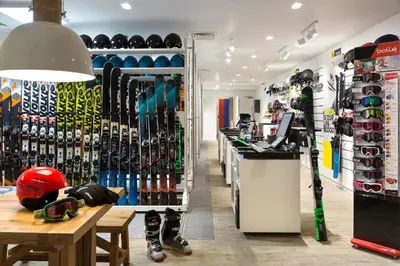 a store with skis and helmets on display in a store at RockyPop Chamonix - Les Houches in Les Houches