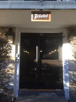 a front door of a hotel with a sign above it at Studio Aoste in Chamonix-Mont-Blanc