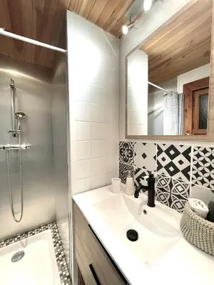 a bathroom with a sink and a shower at Chalet 4C in Les Houches