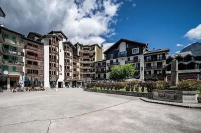 a large parking lot in front of some buildings at Eden Studio Chamonix Centre in Chamonix-Mont-Blanc