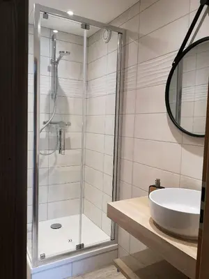 a bathroom with a shower and a sink at Duo Des Alpages vue exceptionnelle sur le Mont Blc in Saint-Gervais-les-Bains