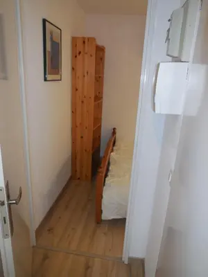 a small room with a bunk bed and a door at SKI DORIS 310 Flaine Forêt in Flaine