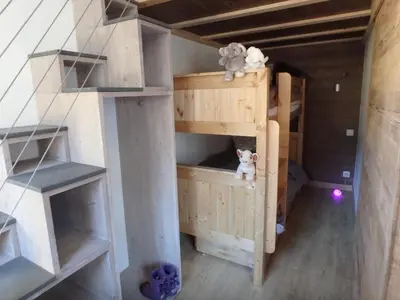 a room with bunk beds in a house at Chamonix IRIS in Chamonix-Mont-Blanc