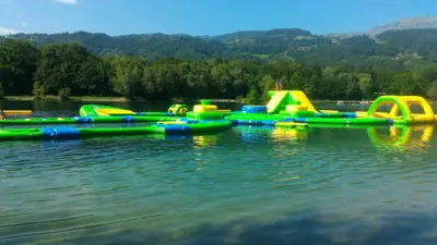 a group of inflatable rides on the water at Duplex Les Périades 18 in Saint-Gervais-les-Bains