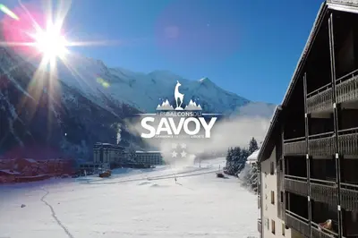 a sign for a ski resort in the snow at Les Balcons du Savoy in Chamonix-Mont-Blanc