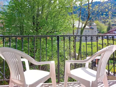 a living room with a couch and a table at Apartment Conseil 3 by Interhome in Saint-Gervais-les-Bains