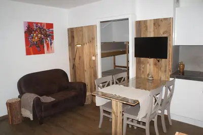 a living room with a couch and a table at Champalo in Chamonix-Mont-Blanc