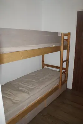 a couple of bunk beds in a room at Champalo in Chamonix-Mont-Blanc