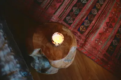 an overhead view of a candle in a room at Duplex en vieux bois hyper centre in Chamonix-Mont-Blanc