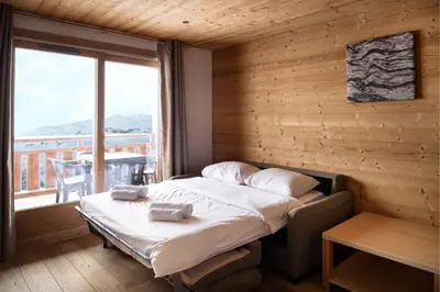 a bathroom with a sink and a shower at Dormio Resort Les Portes du Grand Massif in Flaine