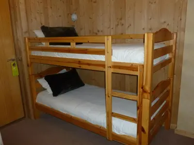 a couple of bunk beds in a room at Aiguille du Midi - Hôtel & Restaurant in Chamonix-Mont-Blanc
