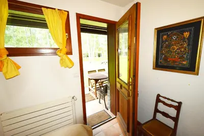a room with a door leading to a patio at Chalet Champraz - Free Parking in Chamonix-Mont-Blanc