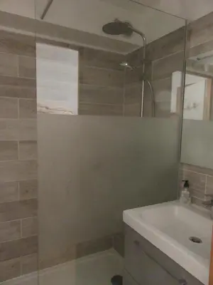 a bathroom with a shower and a sink at Le Prarion 2 in Les Houches