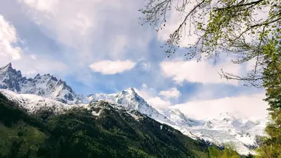 a view of a snow covered mountain range at Au Pied Du Mont-Blanc - Chamonix in Chamonix-Mont-Blanc