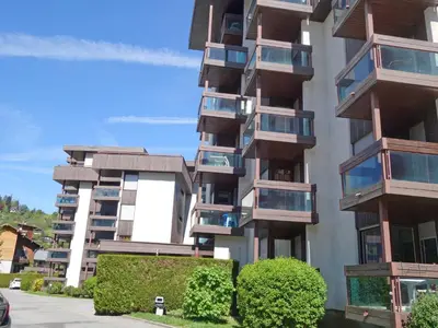 an apartment building with balconies on the side of it at Studio Castel des roches by Interhome in Saint-Gervais-les-Bains