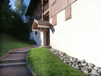a snow covered walkway next to a building with snow at Studio La pointe des Aravis 4 by Interhome in Saint-Gervais-les-Bains