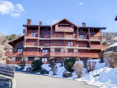 a building with balconies on the side of it at Studio La pointe des Aravis 4 by Interhome in Saint-Gervais-les-Bains