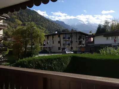 a living room with a couch and a microwave at Apartment Jardins Alpins 5 by Interhome in Saint-Gervais-les-Bains