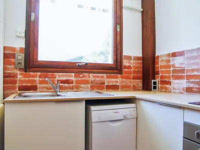 a kitchen with a sink and a window at Apartment Le Brévent-22 by Interhome in Chamonix-Mont-Blanc