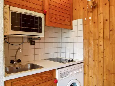 a kitchen with a sink and a microwave at Apartment Le Carlton-7 by Interhome in Chamonix-Mont-Blanc