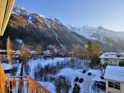 a view of a snow covered mountain from a balcony at Apartment Le Carlton-7 by Interhome in Chamonix-Mont-Blanc