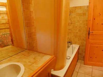 a bathroom with a sink and a toilet and a tub at Apartment Chalet Le Tour by Interhome in Chamonix-Mont-Blanc
