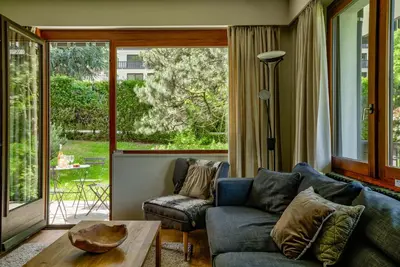 a living room with a couch and a table at Le Brevent 2 Apartment in Chamonix-Mont-Blanc