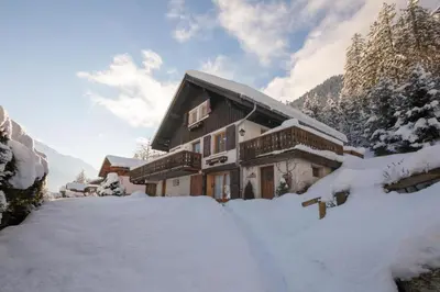 a house in the snow with a lot of snow at MontBlanc Balcony Chamonix in Chamonix-Mont-Blanc