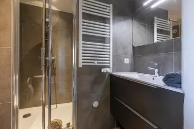 a bathroom with a shower and a sink at Chalet Quatre Saisons in Saint-Gervais-les-Bains