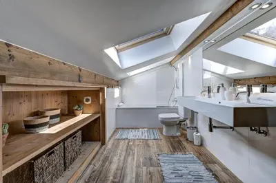 a bathroom with a sink and a toilet at Chalet les Sauberands in Chamonix-Mont-Blanc