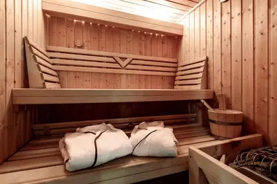 two white towels are sitting in a sauna at Chalet Persan in Megève