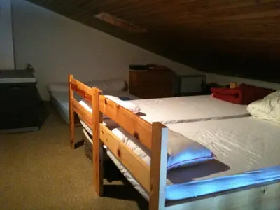 a bedroom with two bunk beds in a room at Amethyste in Saint-Gervais-les-Bains