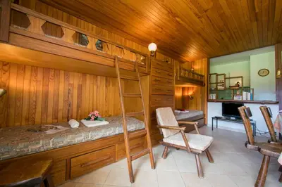 a bedroom with a bunk bed and a ladder at Résidence Grands Montets 110 - Happy Rentals in Chamonix-Mont-Blanc
