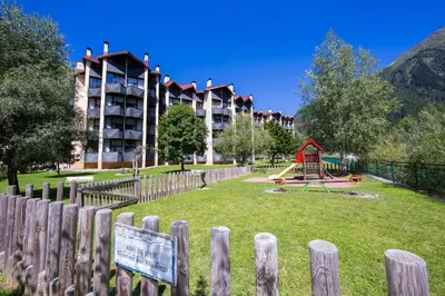 two bunk beds in a small room with two beds at Résidence Grand Roc - Campanules 415 - Happy Rentals in Chamonix-Mont-Blanc