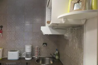 a kitchen with a sink and a counter top at Art Studio in Chamonix-Mont-Blanc