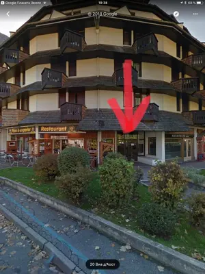 a large building with a red x on it at Art Studio in Chamonix-Mont-Blanc