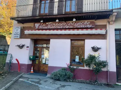 a building with a sign on the front of it at Savran in Saint-Gervais-les-Bains