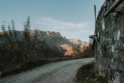 a dirt road with a mountain in the background at Chalet Vaclav in Sixt