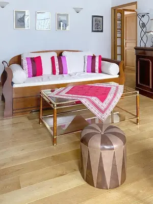 a living room with a couch and a table at L'Outa Panoramique in Chamonix-Mont-Blanc