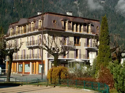 a large building with balconies on the side of it at Quartz-Montblanc in Chamonix-Mont-Blanc