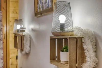a light bulb on a shelf in a room at Studio 
