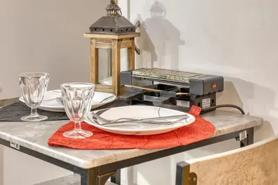 a table with a plate and a machine on it at Studio 