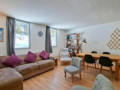 a living room with a couch and a table at Appartement 3 pièces à Flaine, 6 pers, moderne et confortable - FR-1-425-3 in Flaine