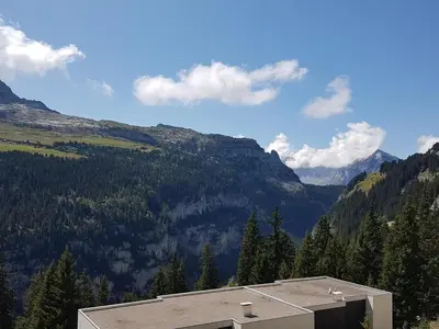 a house with a view of a mountain at Studio lumineux au centre de Flaine avec balcon, équipé pour 4 personnes - FR-1-425-80 in Flaine