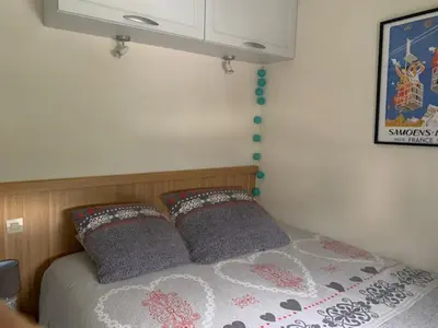 a bedroom with a bed with two pillows at Appartement cosy 2 pièces pour 4 à Morillon 1100, proche pistes - FR-1-815-65 in Morillon