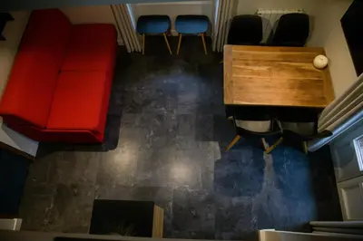 an overhead view of a room with chairs and a table at Appart'Hotel Aiguille Verte & Spa in Chamonix-Mont-Blanc