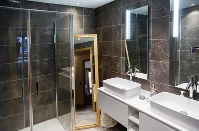 a bathroom with a shower and a sink and a mirror at Luxury appart – Megève – АЕ202 in Megève