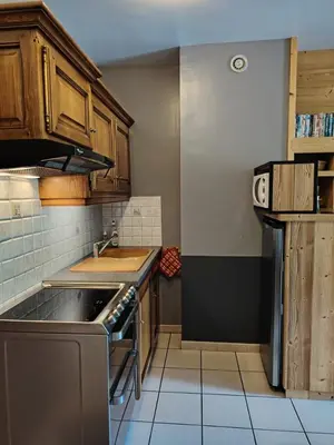 a small kitchen with a sink and a stove at Le Bivouac in Sixt