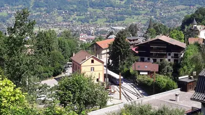 a view of a small town with buildings and trees at Appartement Saint Gervais les Bains in Saint-Gervais-les-Bains