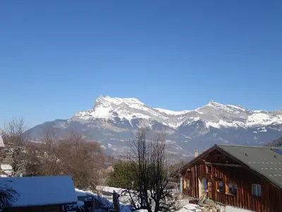 a large house with a porch and a balcony at Apartment Les erables by Interhome in Saint-Gervais-les-Bains